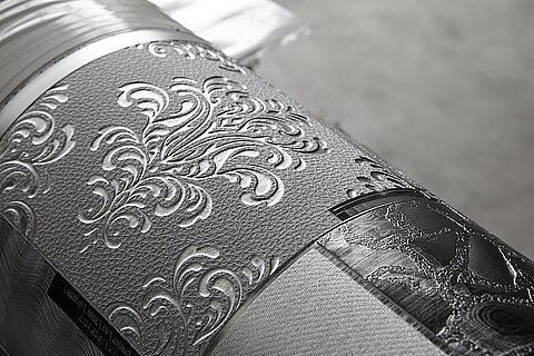 Darstellung eines Prägezylinders für rotatives Prägen mittels Laserdirektgravur.