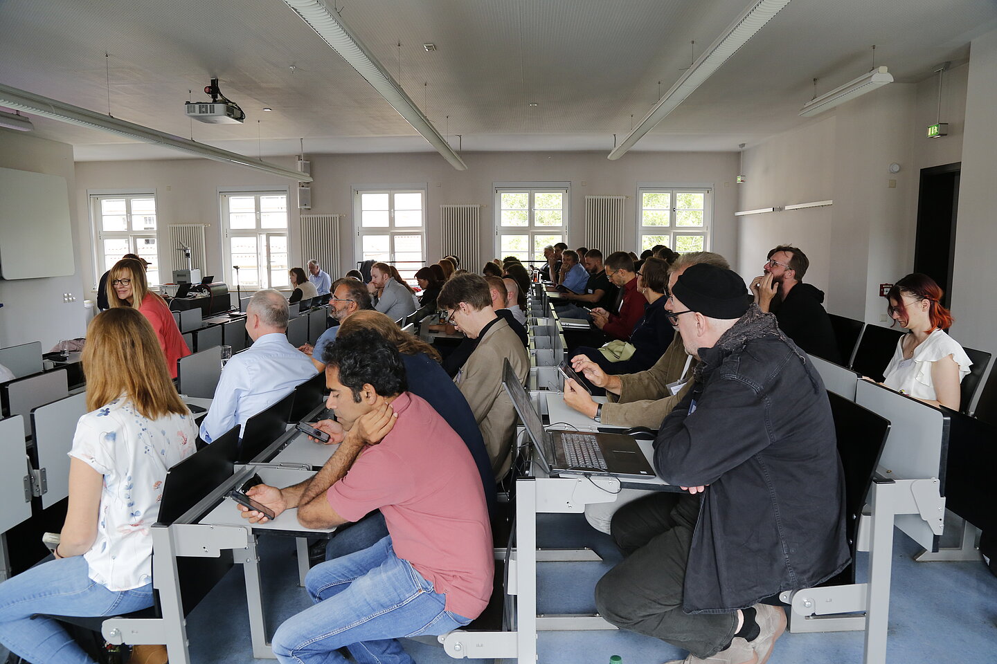 Publikum in einem Hörsaal